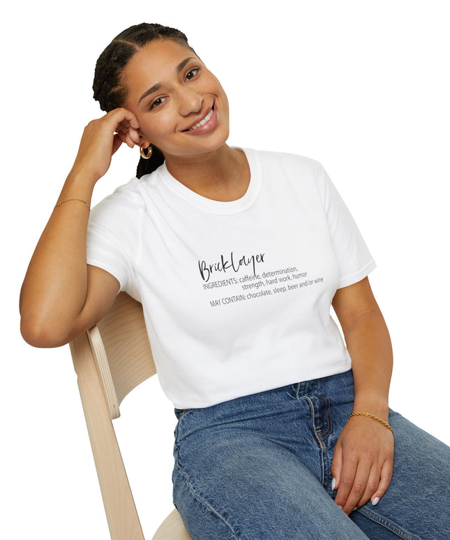 Woman wearing a white t-shirt with bricklayer text, sitting on a chair against a white background