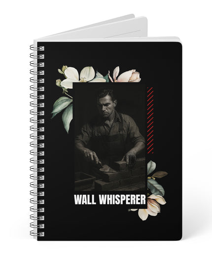 Notebook with a person and floral design on a black background, titled 'Wall Whisperer'.