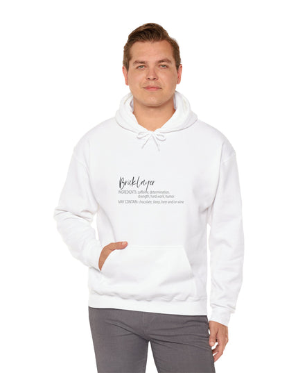 Man wearing a white hoodie with bricklayer text on a white background