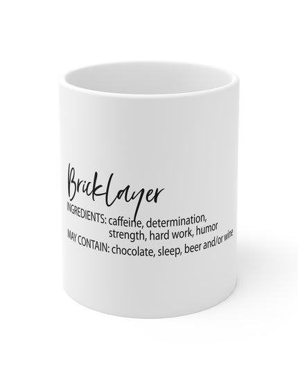 White mug with bricklayer black text on a white background