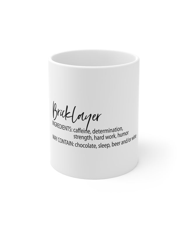 White mug with bricklayer black text on a white background