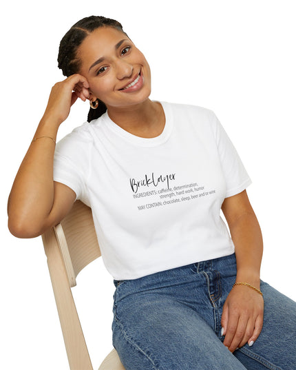 Woman wearing a white t-shirt with bricklayer text, sitting on a chair against a white background