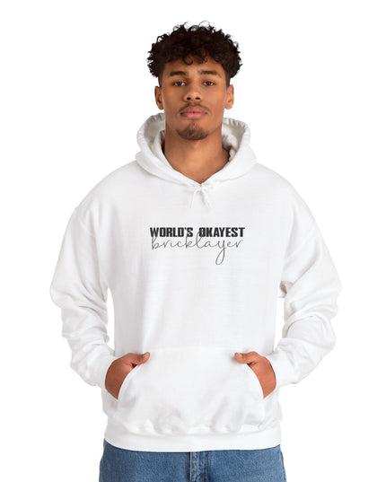 Person wearing a white hoodie with text "World's Okayest Bricklayer" on a white background