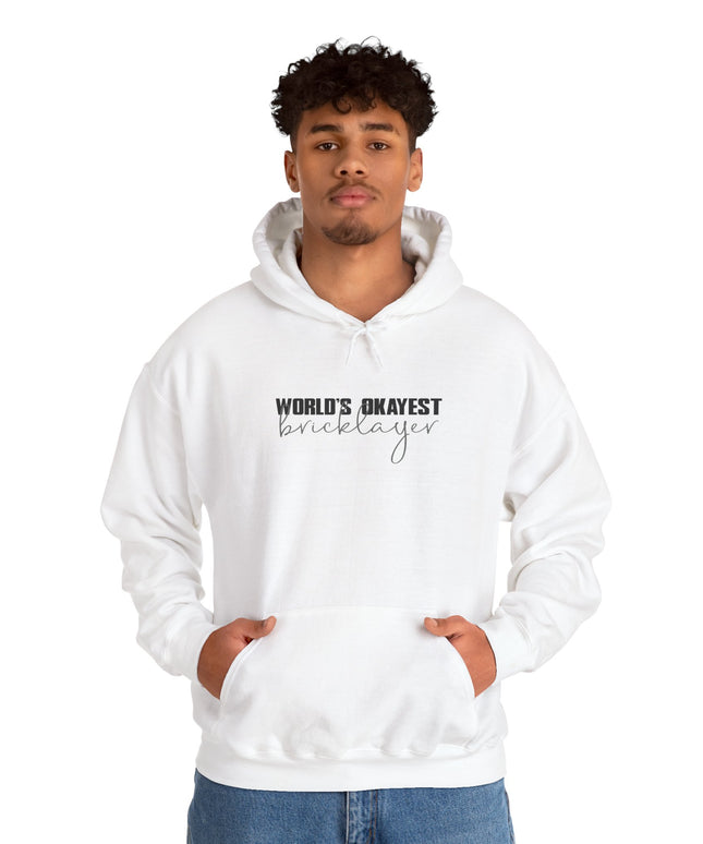 Person wearing a white hoodie with text "World's Okayest Bricklayer" on a white background