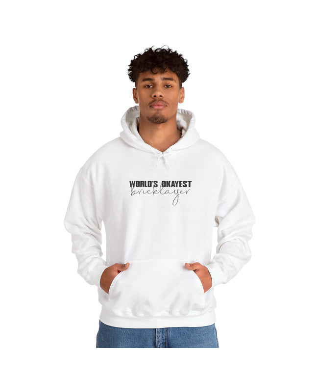 Person wearing a white hoodie with text "World's Okayest Bricklayer" on a white background