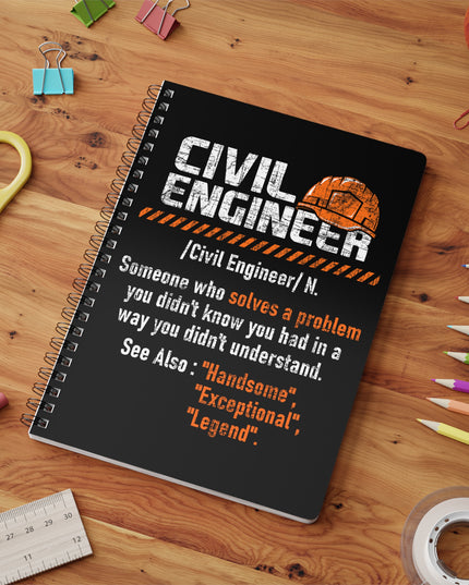 Notebook with 'Civil Engineer' definition on a wooden surface with stationery items