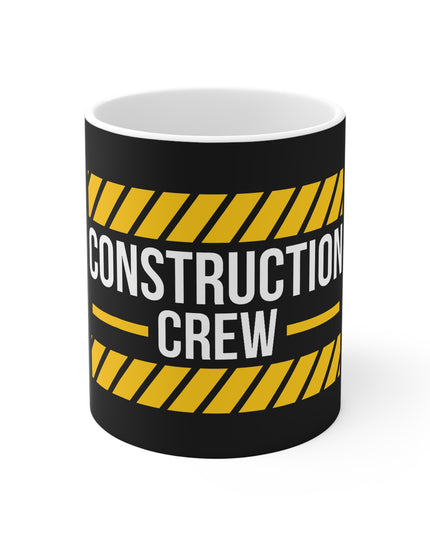Mug with 'Construction Crew' text and yellow hazard stripes on a black background