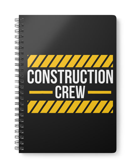 Black notebook with 'Construction Crew' text and yellow hazard stripes on a white background