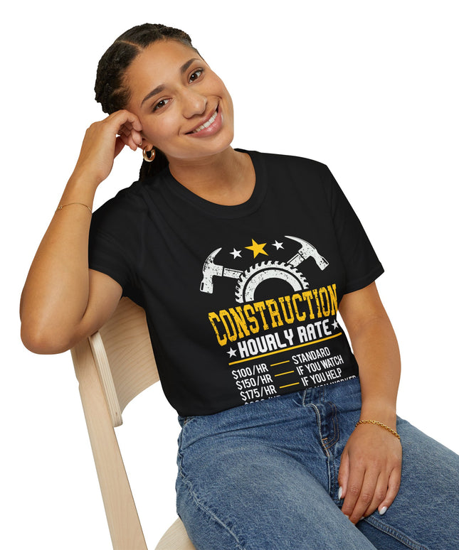 Woman wearing a black t-shirt with a graphic design sitting on a chair.