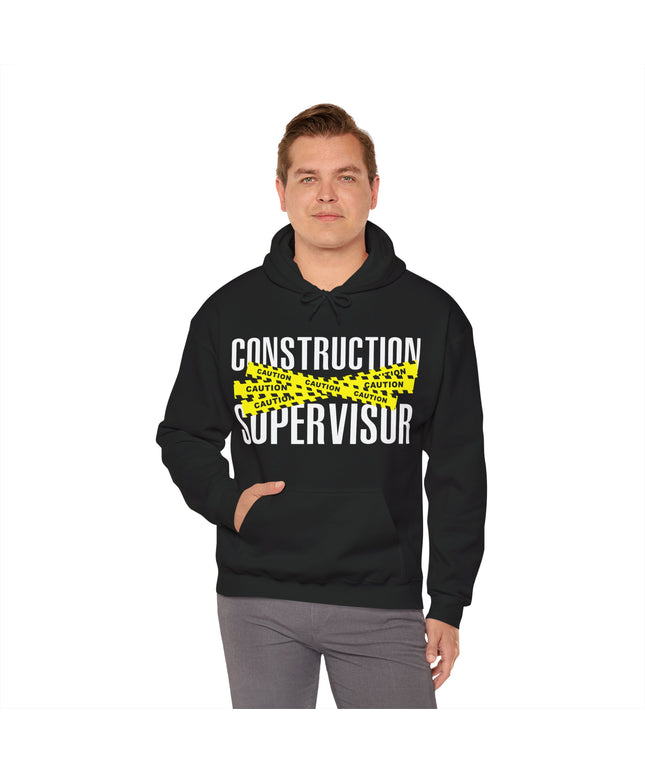Person wearing a black hoodie with 'Construction Supervisor' text on a white background