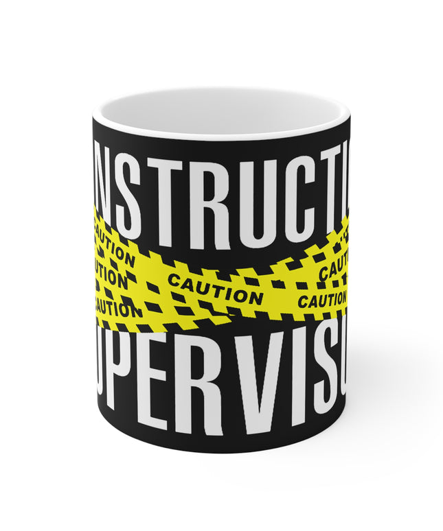Mug with 'Construction Supervisor' and 'Caution' text design on a white background