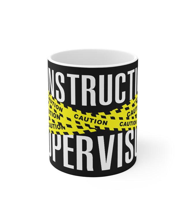 Mug with 'Construction Supervisor' and 'Caution' text design on a white background