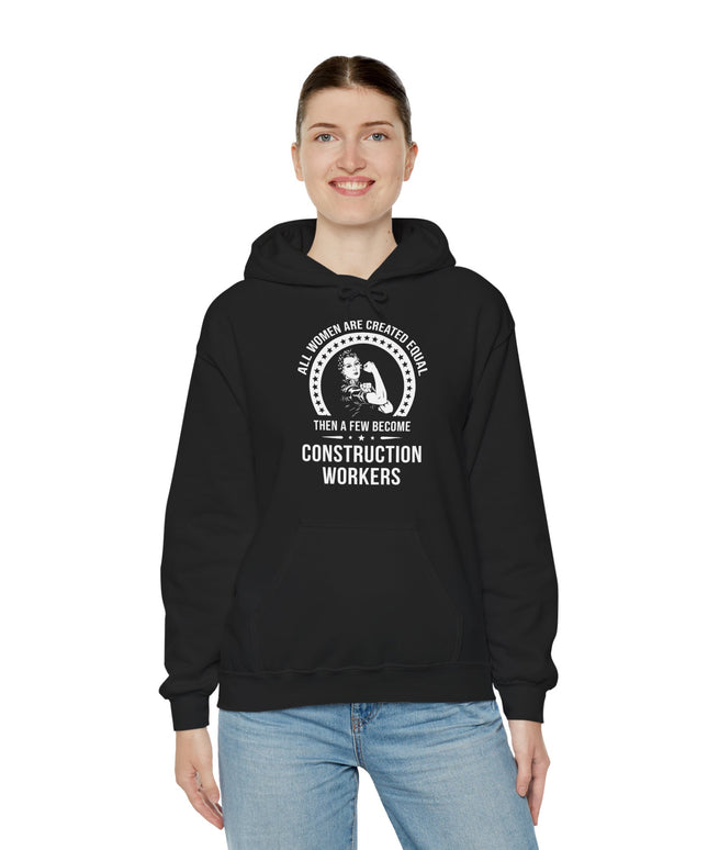 Person wearing a black hoodie with text and graphic design on a white background