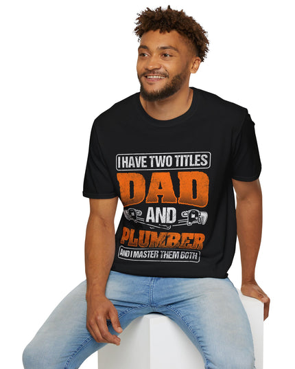 Man wearing a black t-shirt with text 'I have two titles Dad and Plumber and I master them both' on a white background