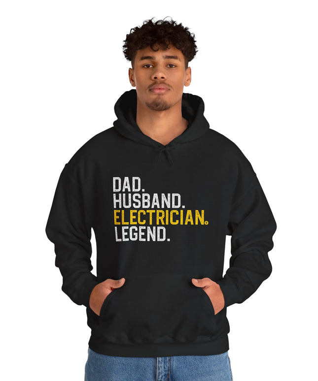 Person wearing a black hoodie with text on a white background