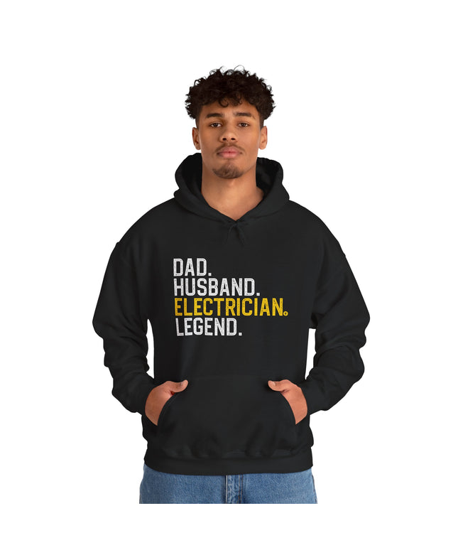 Person wearing a black hoodie with text on a white background