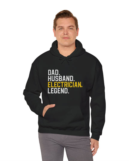 Man wearing a black hoodie with text on a white background
