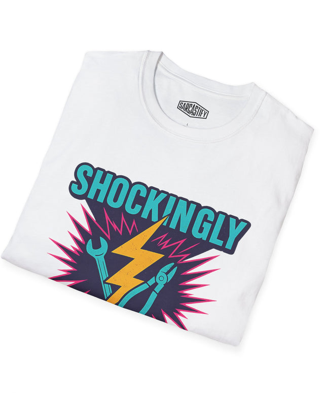 White t-shirt with colorful graphic design and 'SHOCKINGLY' text on a white background